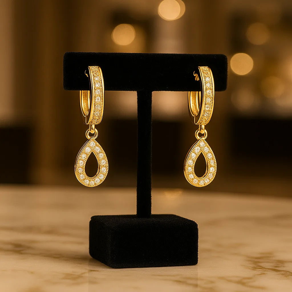 Huggies Earring with a Teardrop Pendant