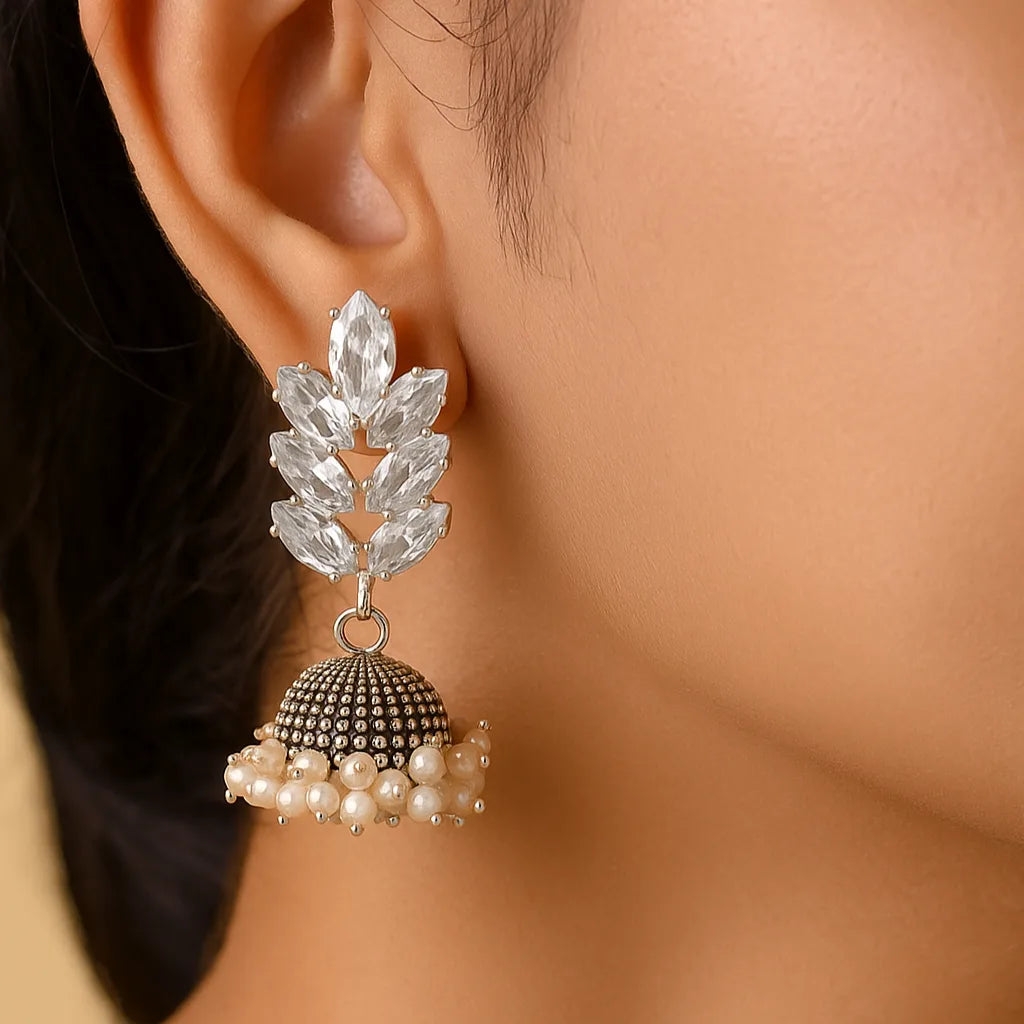 Silver Jhumka Earrings with White Stone and Pearl Embellishments